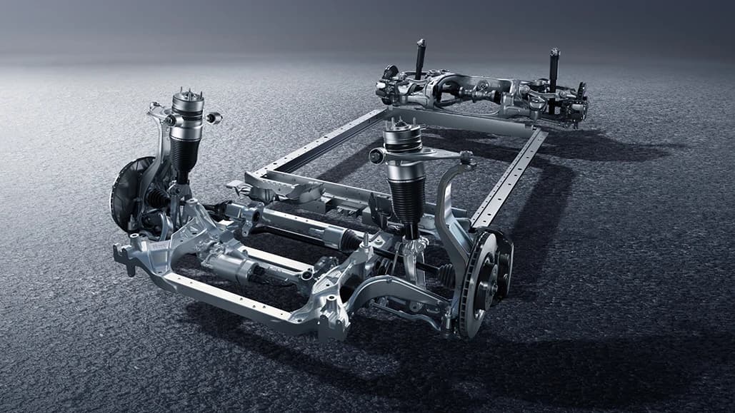 Track-Grade Chassis — all-aluminum, ±14° rear-wheel steering, Brembo